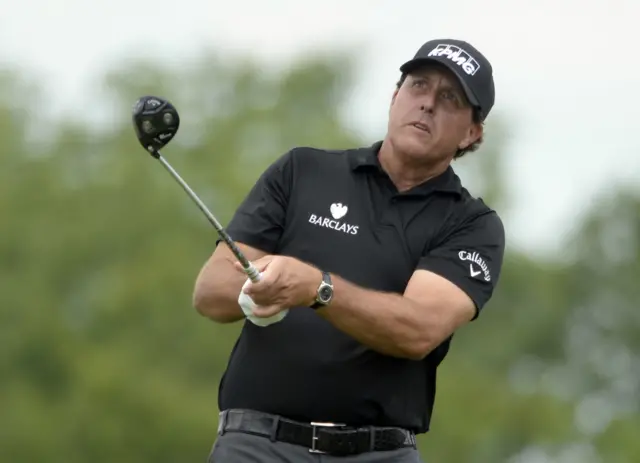 Phil Mickelson plays a shot