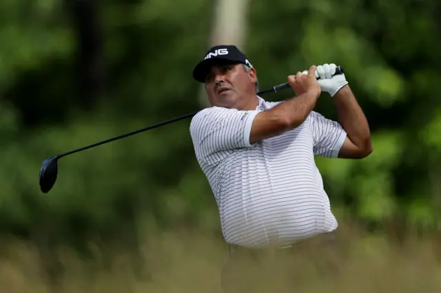 Angel Cabrera plays a shot on the fourth