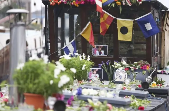 Tributes to Labour Party MP Jo Cox are placed on her houseboat in Wapping in London