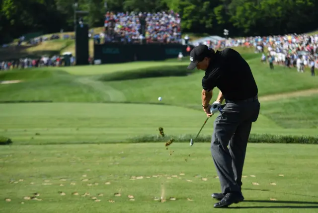 Phil Mickelson hits a tee shot