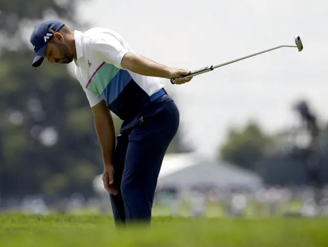 Sergio Garcia reacts to his putt