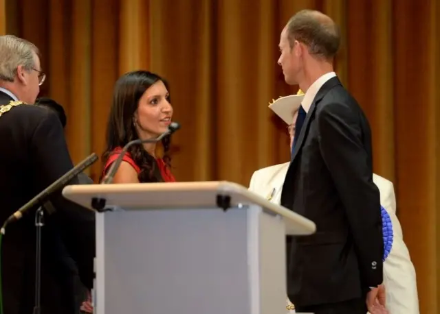 Rosena Allin-Khan (left) is congratulated by Conservative candidate Dan Watkins