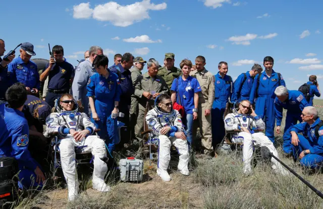 Peake, Malenchenko and Kopra on a warm afternoon on the Steppe