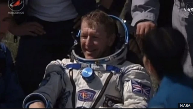 Tim Peake lands