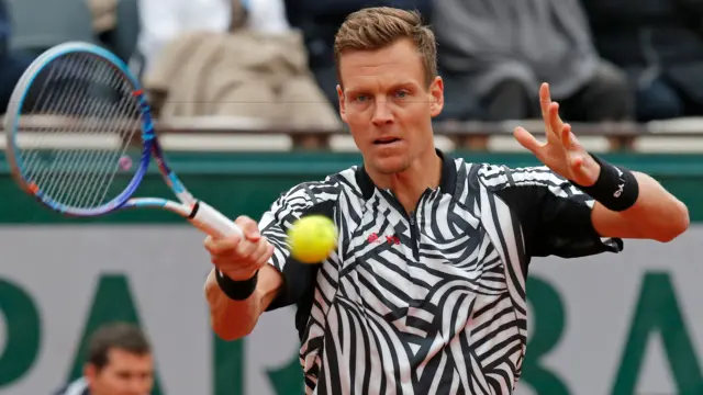 Tomas Berdych hits a shot