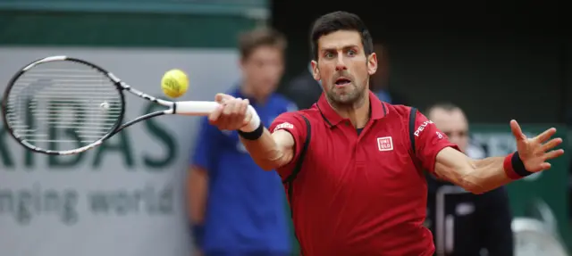 Novak Djokovic hits a forehand