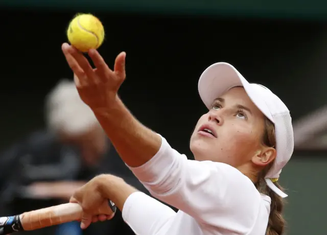 Yulia Putintseva prepares to serve