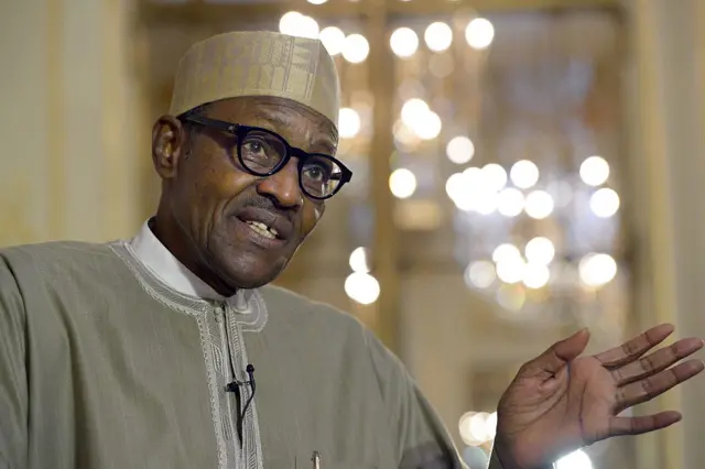 Nigerian President Muhammadu Buhari speaks to the press in Paris on September 16, 2015