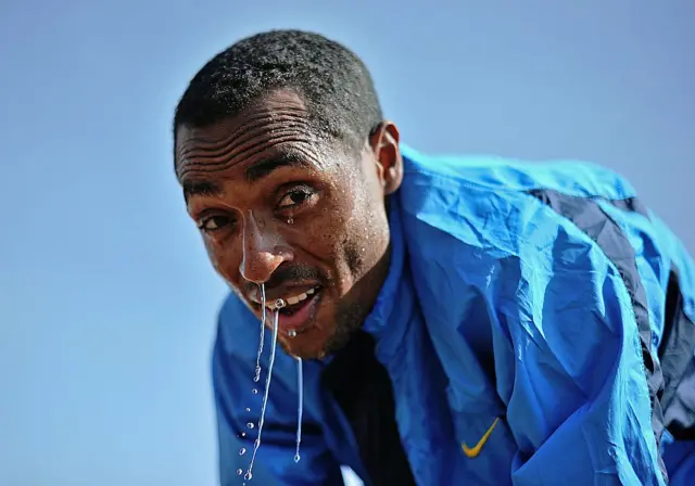 Ethiopia's long distance and marathon runner Kenenisa Bekele takes a break at his training grounds in Sululta near Addis Ababa on January 16, 2014