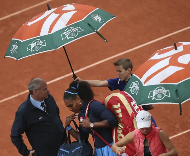 Serena Williams leaves the court