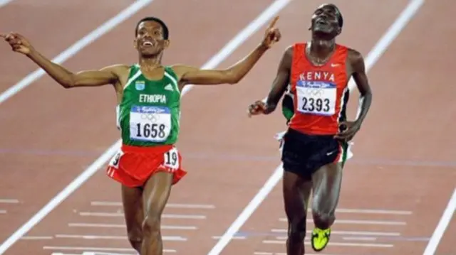 Haile Gebrselassie of Ethiopia beats Paul Tergat of Kenya to win gold in the Mens 10000m Final at the Olympic Stadium on Day Ten of the Sydney 2000 Olympic Games in Sydney