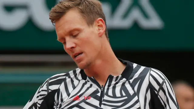 Tomas Berdych looks dejected