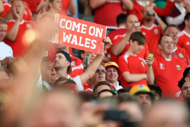 Welsh fans hold up sign