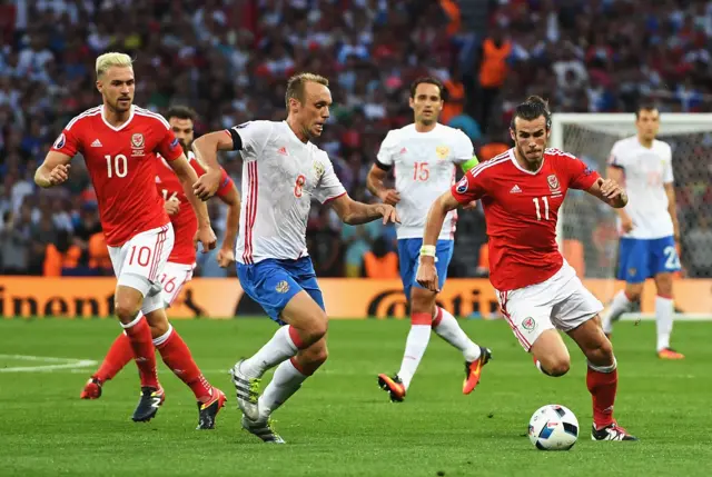 Gareth Bale runs with the ball