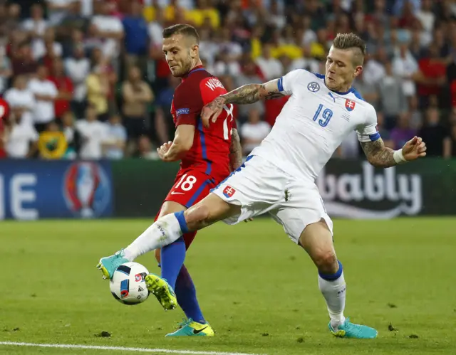 Jack Wilshere is tackled