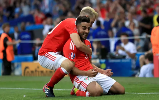 Neil Taylor celebrates goal