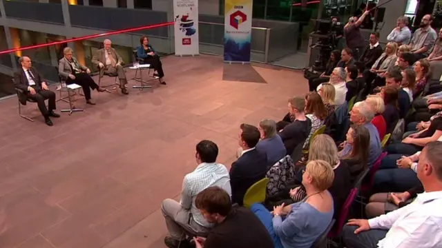 Debate audience ask a question