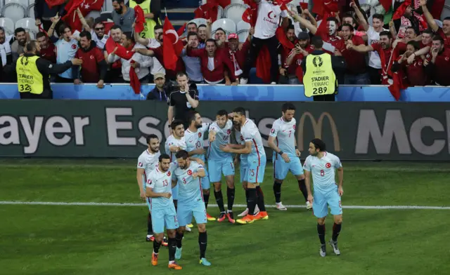 Burak Yilmaz celebrates with his team