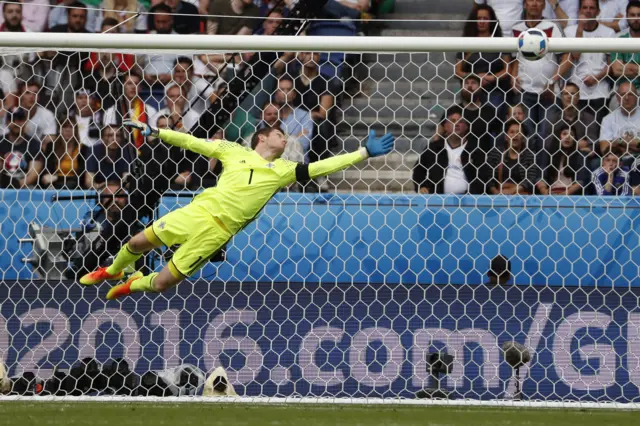 Michael McGovern jumps for the ball