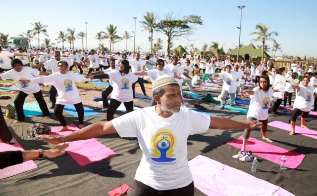 People doing yoga in Durban, South Africa