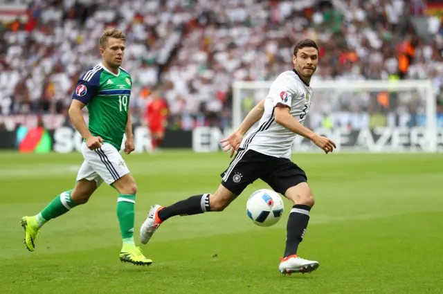 Jonas Hector of Germany and Jamie Ward