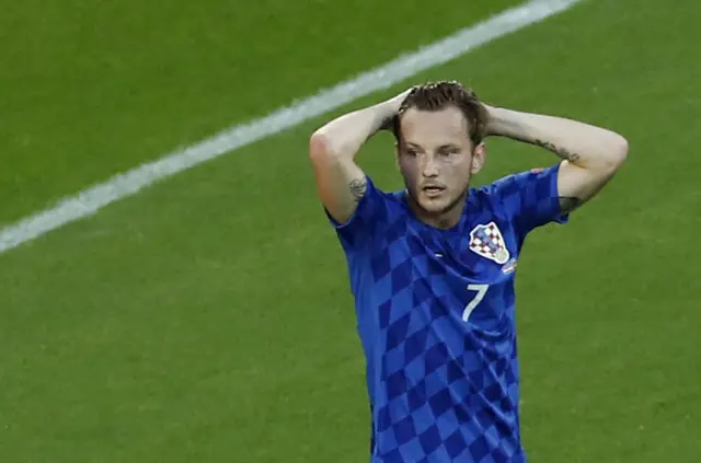 Ivan Rakitic reacts