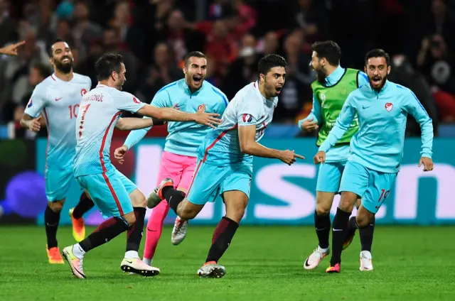 Ozan Tufan of Turkey celebrates