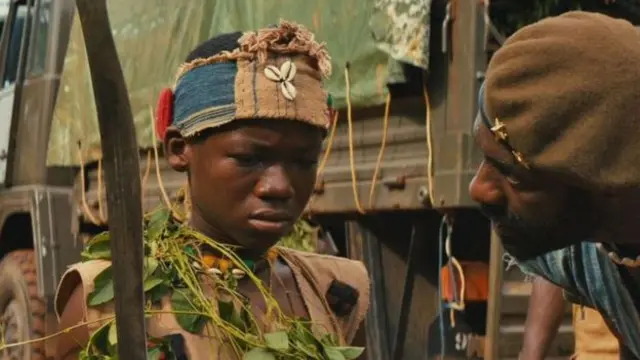 Attah playing a child solider alongside Idris Elba