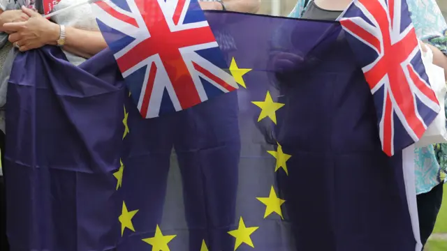 Union Jack flags and EU flag