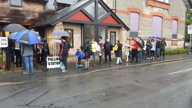 People queue to vote in Cambridge