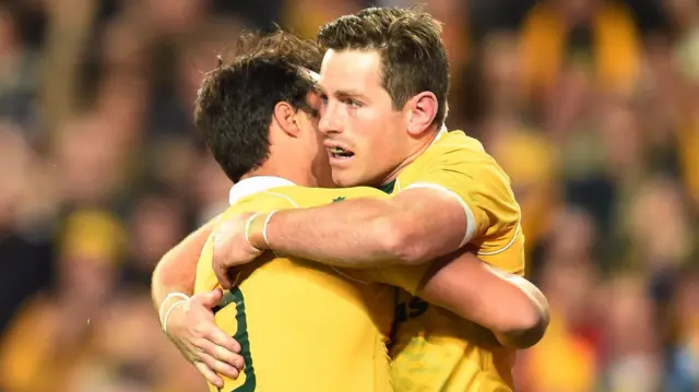 Bernard Foley celebrates his try