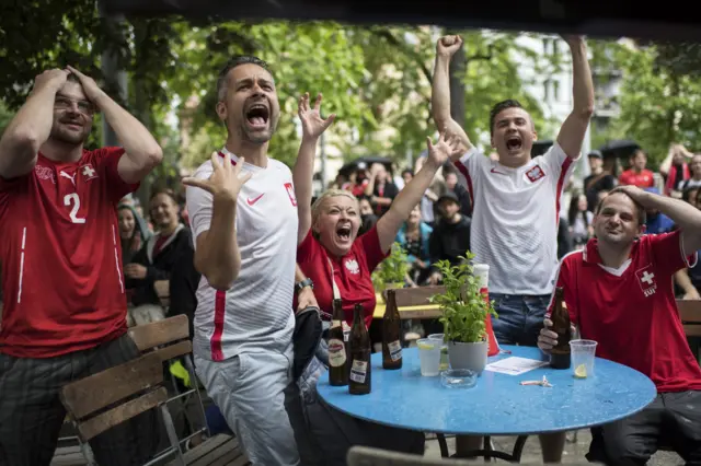 Switzerland and Poland supporters