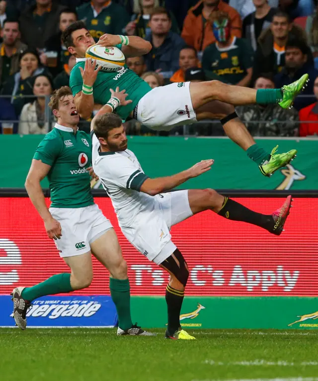 Tiernan O'Halloran is taken in the air by Willie Le Roux