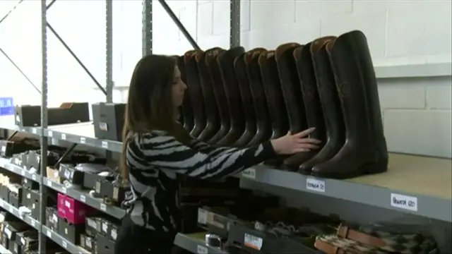 Woman stacking wellies