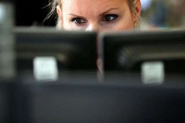 Woman at Bloomberg terminal