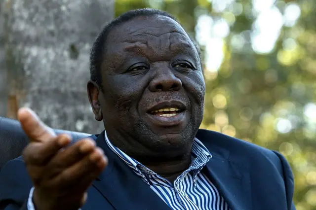 Morgan Tsvangirai gestures during an interview with Agence France-Presse (AFP) journalists at his home in the capital Harare on May 10 2016 in Harare