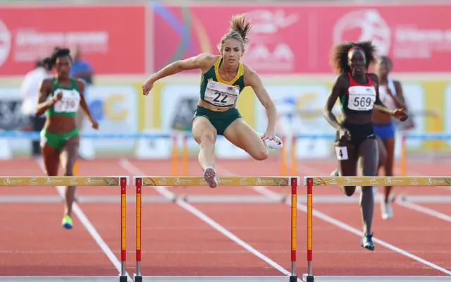 South Africa Wenda Nel jumps as she runs the 400m hurdles for women during day 5 of the Confederation of African Athletics (CAA) Championships held in Durban, South on June 26, 2016