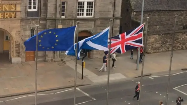 EU, Union flags and the Saltire at Holyrood