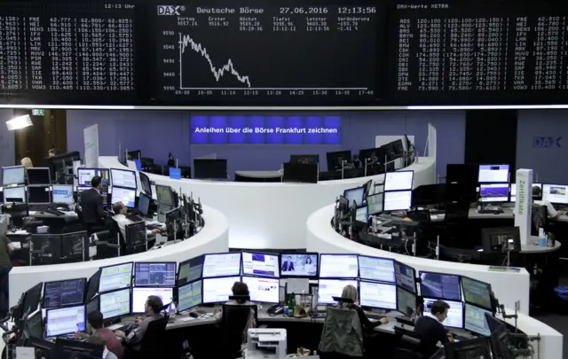 Traders at their desks in Frankfurt