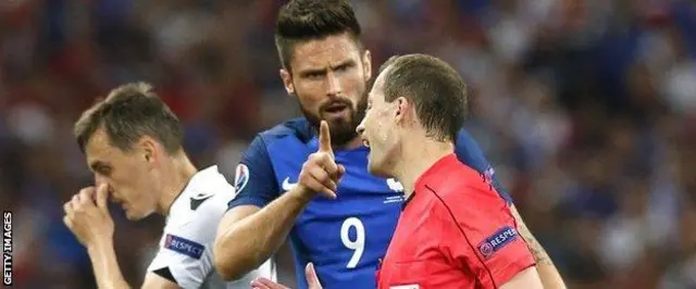 Willie Colum has a disagreement with France striker Olivier Giroud