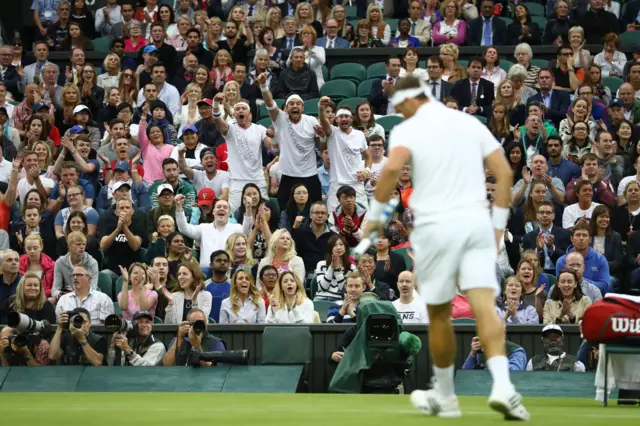 Marcus Willis is cheered on by fans