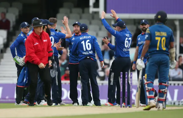 England celebrate the early wicket