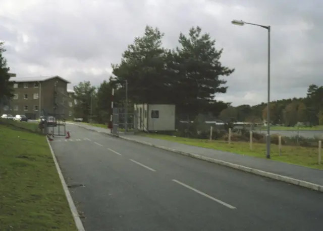 Photograph taken in 1995 of the exterior of the camp, facing towards the barracks