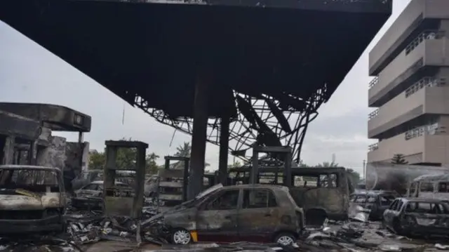 Fuel from the petrol station was spread by flood waters - and then ignited