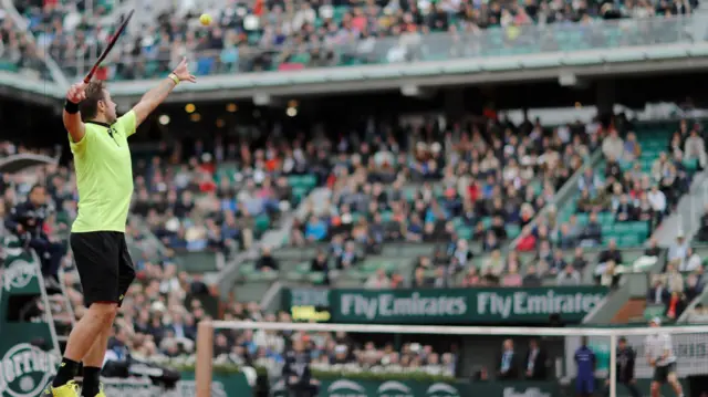 Stanislas Wawrinka serves