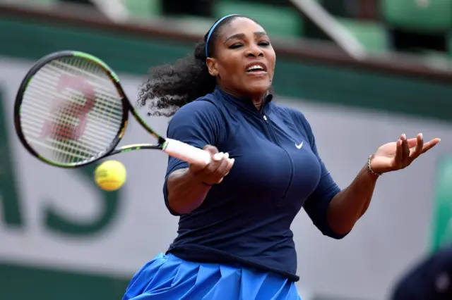 Serena Williams hits a return