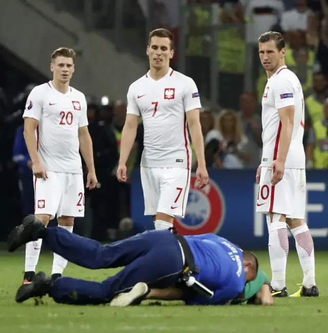 Pitch invader at Poland v Portugal