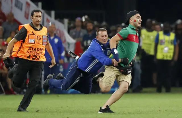 Pitch invader at Poland v Portugal