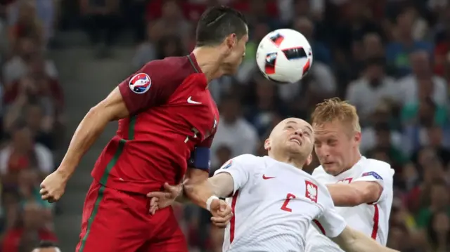 Cristiano Ronaldo wins a header