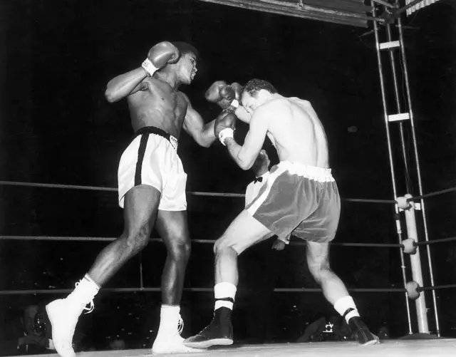 Ali fights Henry Cooper at Wembley Stadium in London on 18 June 1963